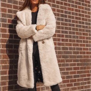 Cream faux fur coat